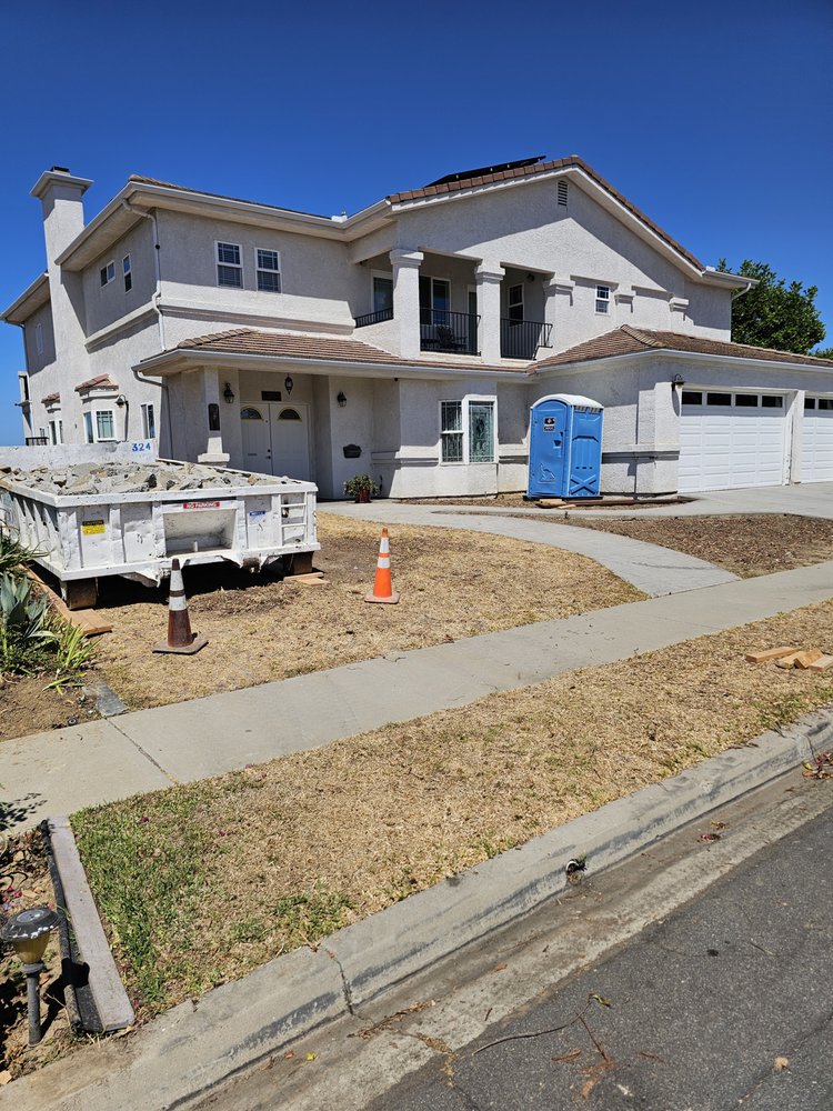 Exterior construction with materials on site by IBR Saldana